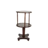 A REGENCY MAHOGANY CIRCULAR TWO TIER DUMB WAITER, with reeded moulding above three rope twist column