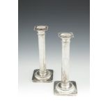 A PAIR OF AMERICAN SILVER CANDLESTICKS, stamped 'Theodore B. Starr New York', each fitted with