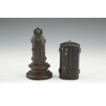 A JAPANESE PORTABLE SHRINE, 19th century, the black lacquer case enclosing an intricately carved