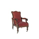 AN EARLY VICTORIAN MAHOGANY FRAMED UPHOLSTERED RECLINING ARMCHAIR with moulded frame and scroll