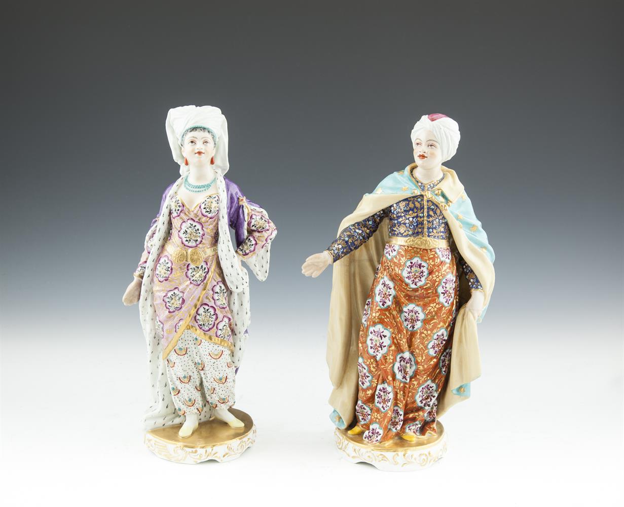 A PAIR OF ENGLISH EARLY 19TH CENTURY PORCELAIN FIGURINES MODELLED AS A SULTAN & SULTANA, each figure