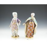 A PAIR OF ENGLISH EARLY 19TH CENTURY PORCELAIN FIGURINES MODELLED AS A SULTAN & SULTANA, each figure