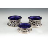 TWO SIMILAR IRISH SILVER SMALL DISH RINGS, Dublin 1906 & 1919, mark of Edmond Johnson, with pierced,