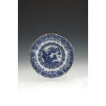 A CHINESE BLUE AND WHITE DISH, Kangxi period, late 17th/early 18th century, painted to the centre