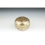 A JAPANESE BRONZE CIRCULAR BOX AND COVER, engraved with scattered leaves picked out in mixed metals,