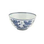 A CHINESE MING PORCELAIN BLUE AND WHITE CARGO BOWL, Wan Li, 16th Century, painted with flowering