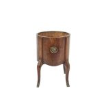 A FRENCH FRUITWOOD CIRCULAR JARDINIERE with applied brass ring handles and raised on cabriole legs