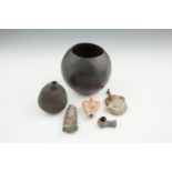 A COLLECTION OF EGYPTIAN AND ROMAN ANTIQUITIES, including an ancient steatite bottle of globular
