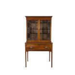 A 19TH CENTURY MAHOGANY BOOKCASE, the glazed top with fitted shelves on a table base, with