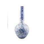 A LARGE JAPANESE BLUE AND WHITE BOTTLE VASE, c.1900, the tapering neck painted with a dense
