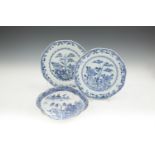 A PAIR OF CHINESE 'SILVER SHAPED' BLUE AND WHITE DISHES, 18th century. 22cm diameter; together