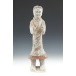 A CHINESE POTTERY MODEL OF A STANDING FIGURE, in Han style, modelled with outstretched hands. 50cm