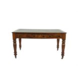 A VICTORIAN MAHOGANY AND LEATHER INSET WRITING TABLE, the rectangular top with moulded edge over