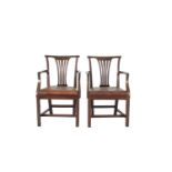 A PAIR OF IRISH GEORGE III MAHOGANY ELBOW CHAIRS, each with carved top rail, pierced splats and drop