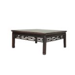 A 19TH CENTURY CHINESE PADOUK SQUARE COFFEE TABLE with pierced frieze, raised on square supports. 90