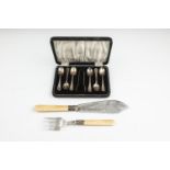 A CASED SET OF SILVER TEASPOONS AND TONGS, Birmingham 1923 each of 'bead and reel' desing, togther