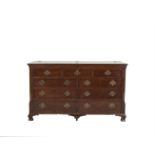 A LARGE GEORGIAN STYLE MAHOGANY RECTANGULAR CHEST, the hinged top above five false drawers and