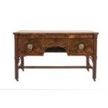 A MID 19TH CENTURY INLAID MAHOGANY RECTANGULAR KNEEHOLE SIDEBOARD, the plain top raised above a