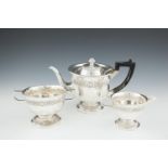 AN IRISH SILVER THREE-PIECE TEA SERVICE, Dublin 1908, makers mark of Edmond Johnson, comprising a