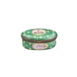 A GEORGE III STAFFORDSHIRE ENAMEL PATCH BOX, C.1800, of oval form with hinged cover decorated with a