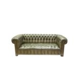 A CHESTERFIELD BUTTON BACK SOFA, covered in olive green hide. 203cm wide x 90cm deep x 74cm high