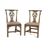 A PAIR OF GEORGE III MAHOGANY STAINED DINING CHAIRS, in the Chippendale taste, with pierced splat