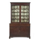 A 19TH CENTURY MAHOGANY COMPOSED BOOKCASE CABINET, with Greek key cornice above twin astragal glazed