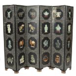 A LARGE CHINESE SIX FOLD INLAID EBON SCREEN, each panel decorated with mother of pearl diamond field