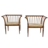 A PAIR OF FRENCH MAHOGANY OPEN BASKET FORM SEATS, with scroll sides and applied gilt roundels raised