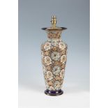 A DOULTON LAMBETH TAPERING VASE, converted to table lamp, decorated with lacework in gilt, salmon