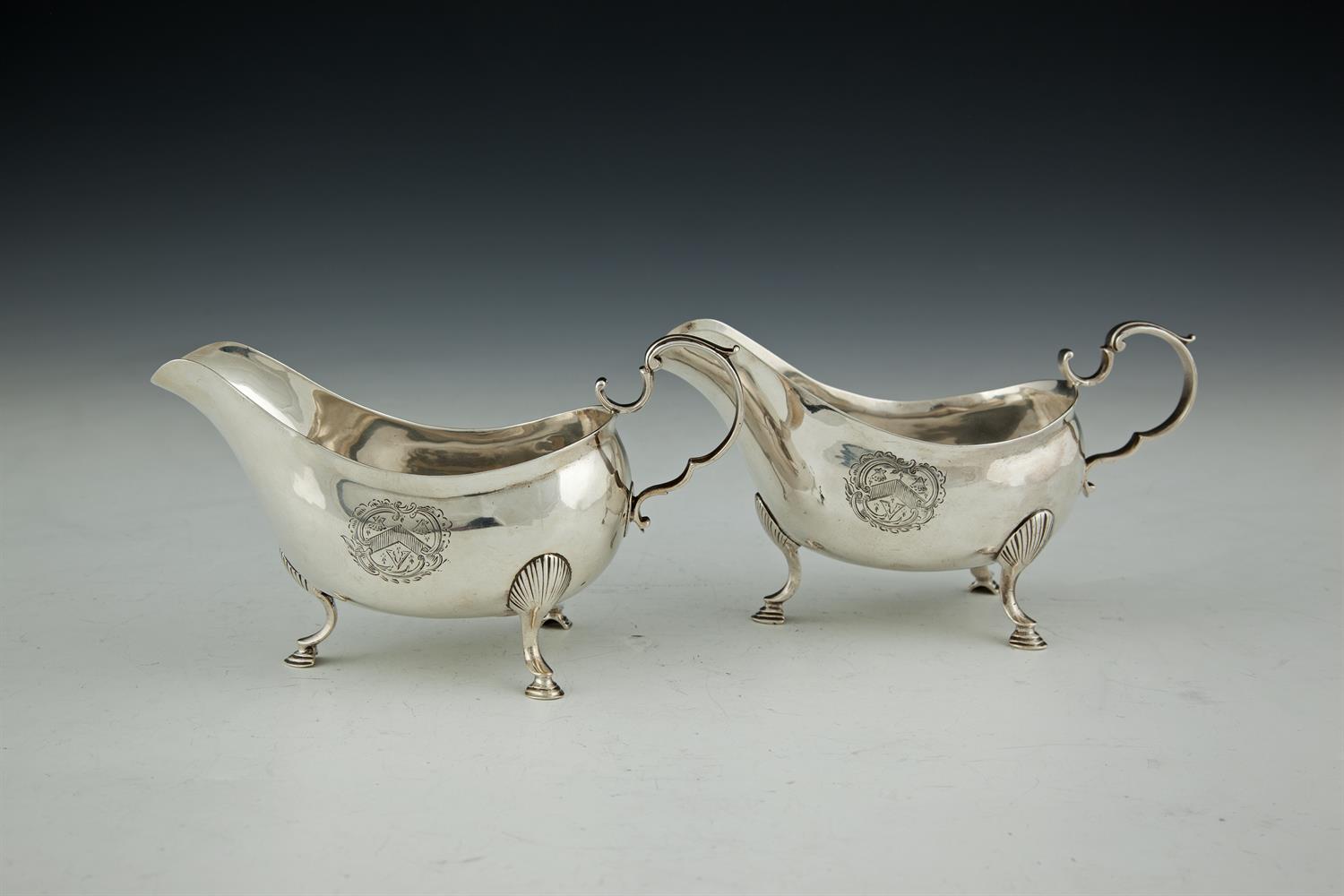 A PAIR OF IRISH GEORGE III SILVER SAUCEBOATS, by Matthew West of Dublin, c.1778, each of plain form,