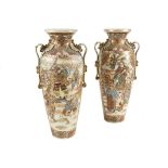 A PAIR OF JAPANESE SATSUMA EARTHENWARE VASES, c.1920s, each of ovid form with flared neck and twin