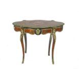 A 19TH CENTURY BOULLE CENTRE TABLE, the shaped oval top with ebonised banding and ormolu rim above a