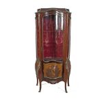 A KINGWOOD GLAZED DISPLAY CABINET IN FRENCH STYLE, c.1900, with bowed glazed door above a bombée ‘