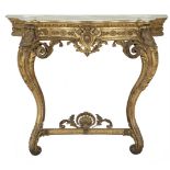 A VICTORIAN GILTWOOD PLASTER AND GESSO CONSOLE TABLE, the white veined marble top with moulded rim