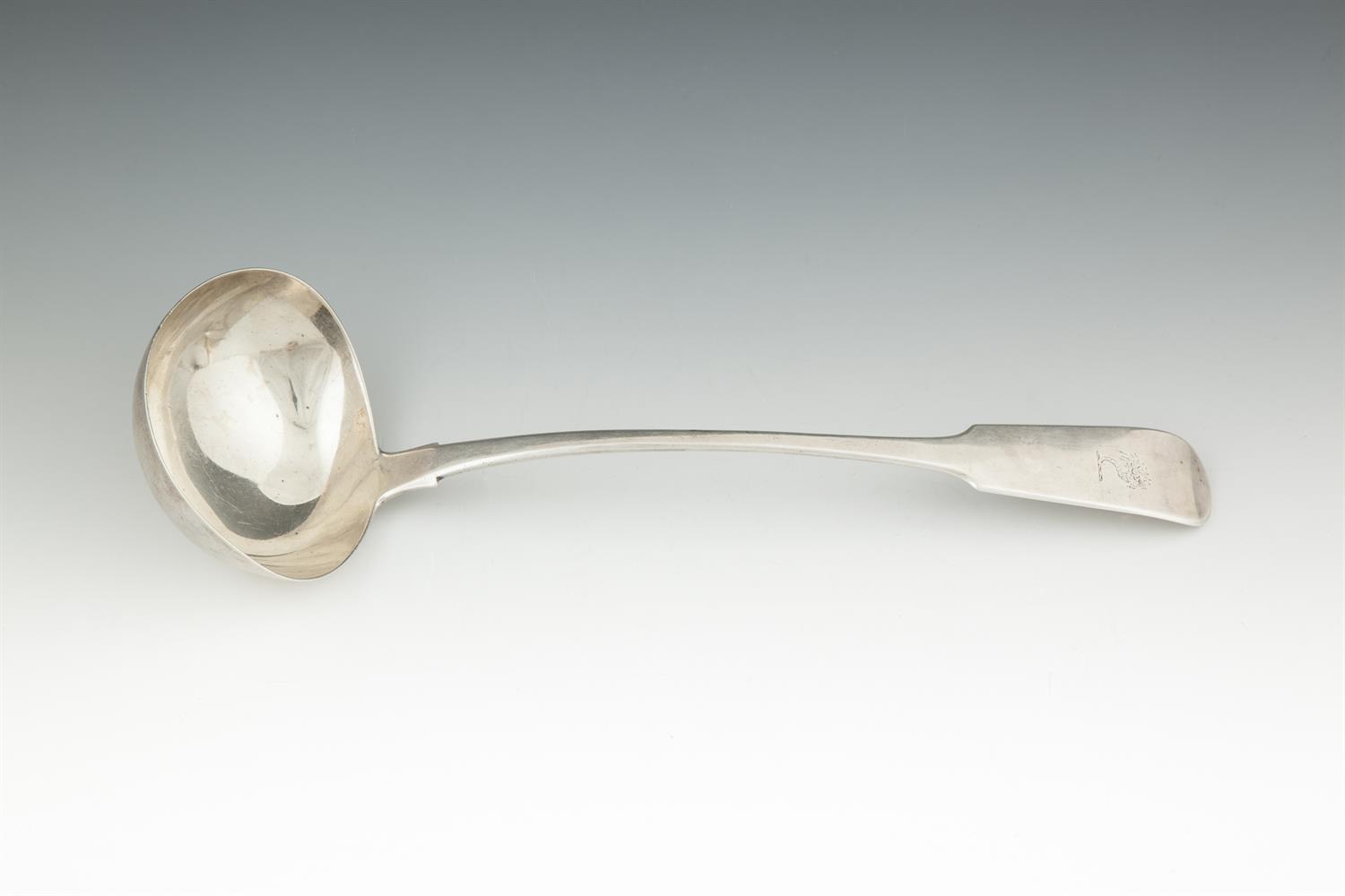 A GEORGE IV FIDDLE PATTERN SILVER LADLE, Dublin 1824, makers mark of Thomas Farnett, with rat-tail