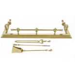 A CAST BRASS CURB RAIL FENDER, the stepped base surmounted with reeded rails with eagle claw