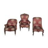 TWO VICTORIAN MAHOGANY FRAMED UPHOLSTERED ARMCHAIRS, each with arched padded back covered in crimson
