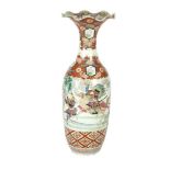 A LARGE IMARI STYLE BALUSTER SHAPED FLOOR VASE, with waved rim, decorated in an Imari palette