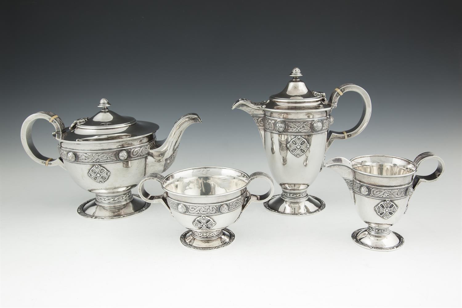 AN IRISH SILVER FOUR PIECE TEA AND COFFEE SERVICE, Dublin 1917, mark of T.W., in the Ardagh pattern,