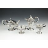AN IRISH SILVER FOUR PIECE TEA AND COFFEE SERVICE, Dublin 1917, mark of T.W., in the Ardagh pattern,