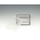 A LALIQUE GLASS BOX AND COVER, dated to 1954, of rectangular form with canted corners, the frosted