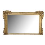 A LARGE VICTORIAN GILTWOOD RECTANGULAR OVERMANTLE MIRROR, with shell and scroll angles, the