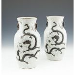 A PAIR OF 19TH CENTURY CHINESE GLAZED EARTHENWARE BALUSTER VASES, with applied dragons and loose