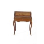 A FRENCH MAHOGANY AND MARQUETRY CYLINDER TOP WRITING DESK, the frieze drawer with opening