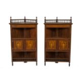 A PAIR OF EDWARDIAN INLAID ROSEWOOD DWARF CORNER CABINETS, with raised gallery sides above an open