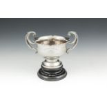AN IRISH SILVER TWO-HANDLED TROPHY CUP, Dublin 1926, of baluster form, inscribed 'Captains Prize