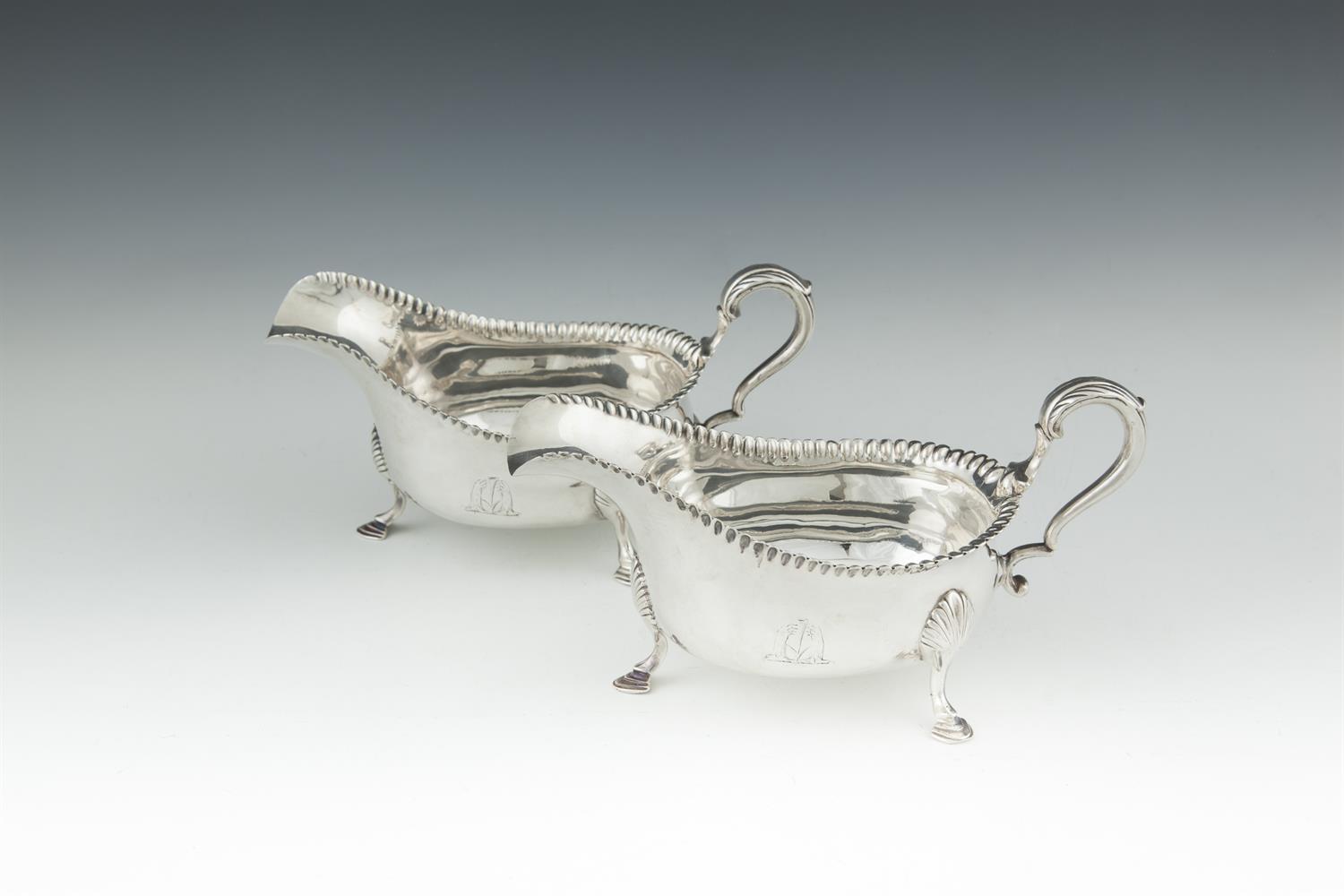 A PAIR OF IRISH GEORGE III CORK PROVINCIAL SILVER SAUCEBOATS OF LARGE PROPORTIONS, c.1777, makers