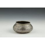 AN ISLAMIC BRASS AND SILVER OVERLAID BOWL, 19th century in Mamaluk style, engraved with bands of