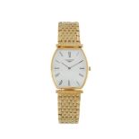 A LADY'S WRISTWATCH LA GRANDE CLASSIQUE, BY LONGINESThe tonneau shaped case with plain white dial